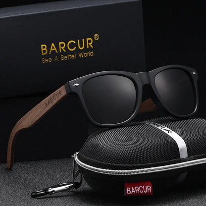 Black sunglasses with wooden arm on a black surface with BARCUR branding.