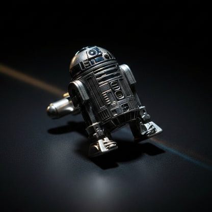 R2-D2 Silver Cufflink on a Black BG with Orange / Blue Prism Light.