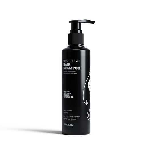 Black shampoo bottle with brand logo on a white background