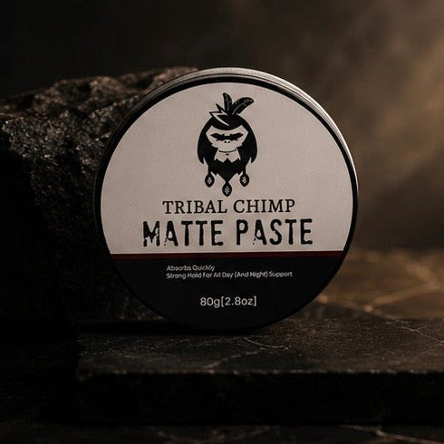 Tribal Chimp Matte Paste container on a dark background