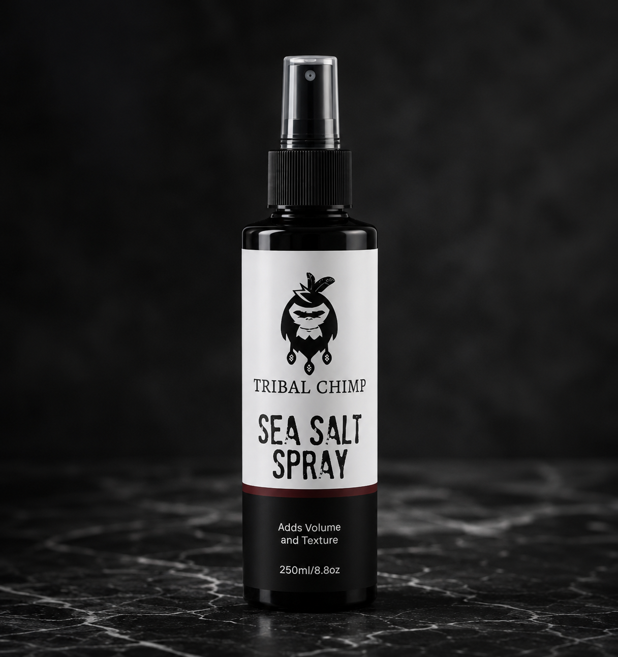 Tribal Chimp Sea Salt Spray bottle on a dark background